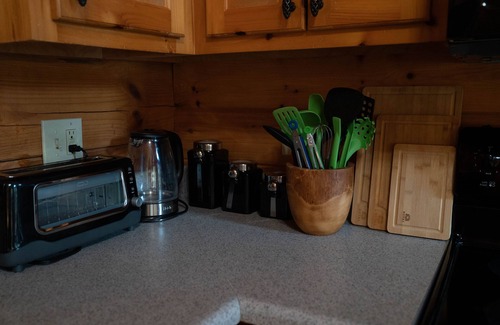 Murphy Cabin | Walk to the river or stay at the cabin w/great outdoor space. Close to the Folk School & Casino