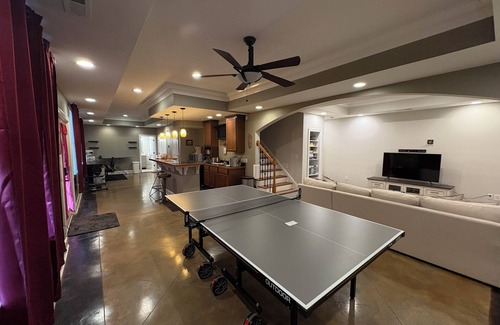 Raleigh Apartment | Walkout Basement apartment with a private entrance facing a wooded backyard.