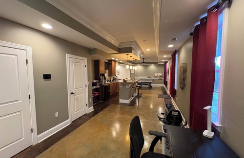 Raleigh Apartment | Walkout Basement apartment with a private entrance facing a wooded backyard.