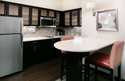 Historic East Village Condo | Warm and Welcoming Suite | Free Breakfast, Indoor Pool + Hot Tub