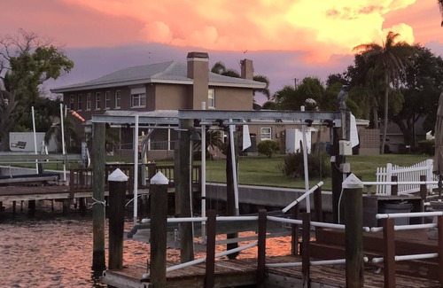 Capri Isle House | Watch sunsets from waterfront deck of 3,000 sq-ft. home in Tampa Bay beach town!