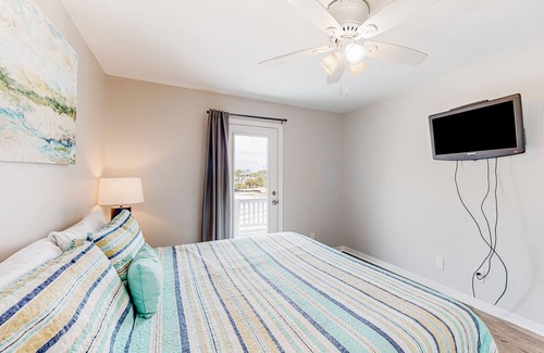 Perdido Key Coves One House | Water-view home with balcony & boat dock & tennis court access