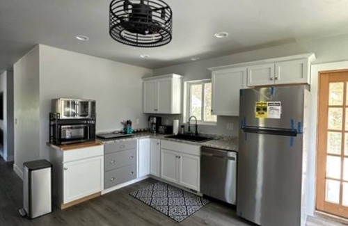 Sturgeon Bay Apartment | Water views from every window, covered porch & private deck, 7 min walk to beach