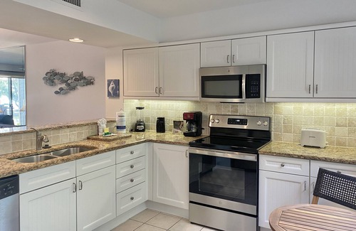 Arcadian Shores Villa | WATER VIEWS WALK 2 BEACH GREAT RENO FULL ACCESS 8C