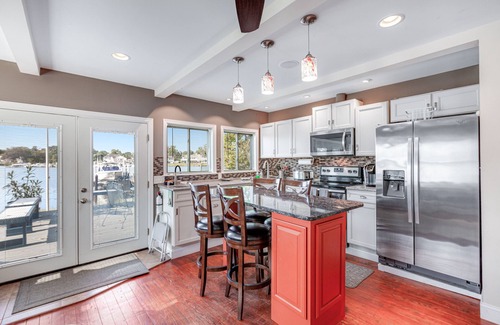 Edgewater House | Waterfront home with spacious deck, dock, washer/dryer & central AC