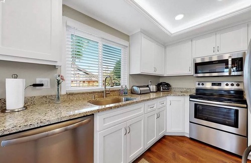 Discovery Bay House | Waterfront modern home Sleeps 6 near Marina w/Hot Tub, Large Deck, and EVCharge