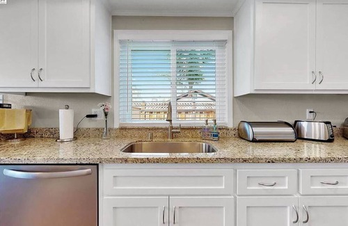 Discovery Bay House | Waterfront modern home Sleeps 6 near Marina w/Hot Tub, Large Deck, and EVCharge