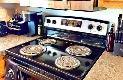 Oconto Cabin | Waterfront Oconto Cabin – 2BR Retreat w/Pier & Free Kayaks, Dogs OK