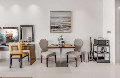 Dubai Investment Park Apartment | Waves - Stylish Studio with Balcony in Dubai South