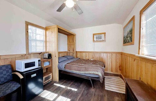 Edgemont Cabin | Welcome to our charming tiny house cabin at Blue Clouds Resort!