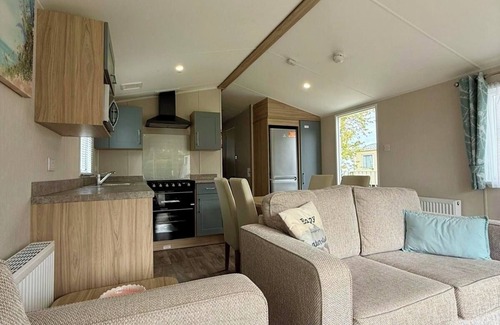 Cross Inn House | Welcoming family caravan on large pitch near beautiful New Quay in West Wales