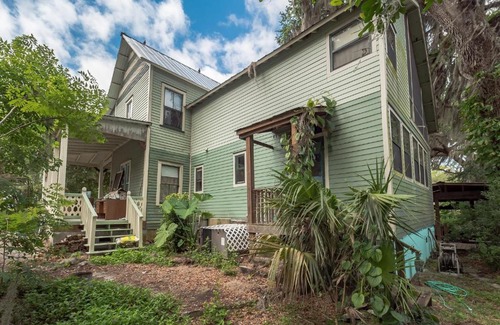 Crescent City House | West Stella Lake House with Outdoor Pool Table & Fireplace residence