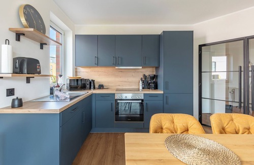 Zentrum Apartment | With a view of the Husum inland harbor, this stylishly furnished vacation apartment offers