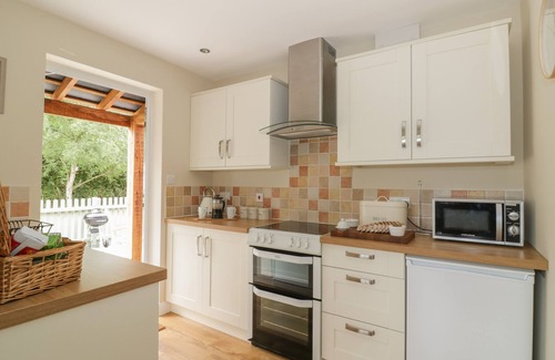 Colchester Cottage | WOODPECKERS, pet friendly, with pool in Alresford, Colchester