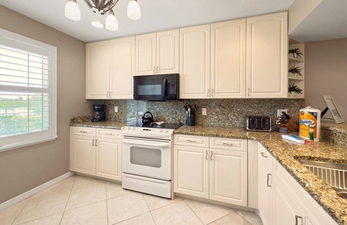 Boca Grande House | Woodwind Beach 11 | Pet Friendly | Beachfront | Community Pool | Sleeps 6