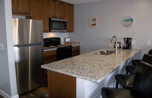 Lake Ozark Condo | WOW! MUST SEE! Newly Remodeled Condo Overlooking Lake, Pool & Hot Tub!