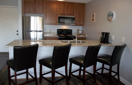 Lake Ozark Condo | WOW! MUST SEE! Newly Remodeled Condo Overlooking Lake, Pool & Hot Tub!