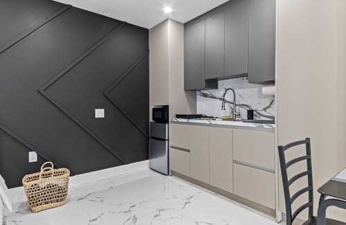 Richmond West Apartment | XL Luxury Room. Luxurious studio retreat with sleek designs.