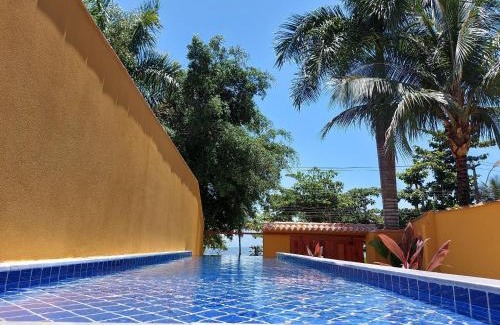 Jabaquara House | Yara - 4 suítes , Frente Praia, piscina em raia, Churrasqueira, Garagem, Wi-Fi