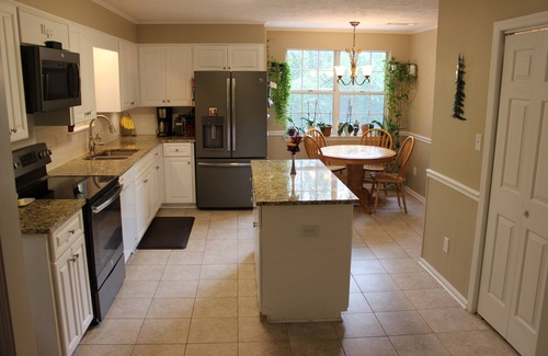 Augusta House | You can hear the roar of the Masters from the front porch!