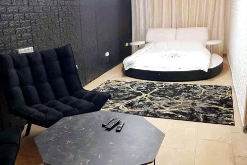 לאון ספא לופט - חדרי אירוח עם בריכה פרטית וסאונה בלב חיפה