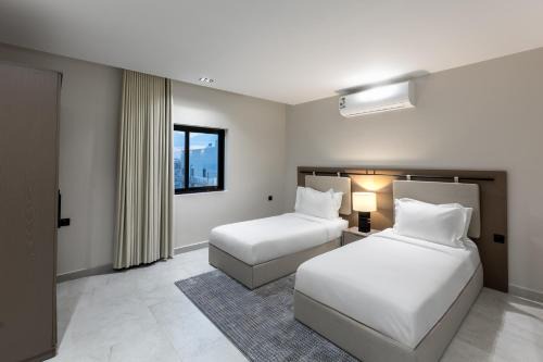 شقة غرفة سريرين وصالة وبوفيه 301A