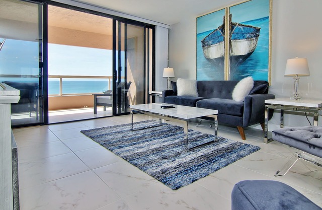 12th-floor beachfront condo with balcony, heated pool, gym, pool spa & tennis