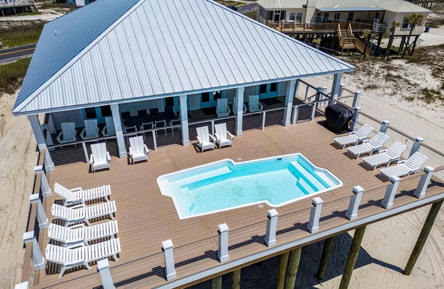 2 dog-friendly beach houses right on the sand w/private heated pool & elevator