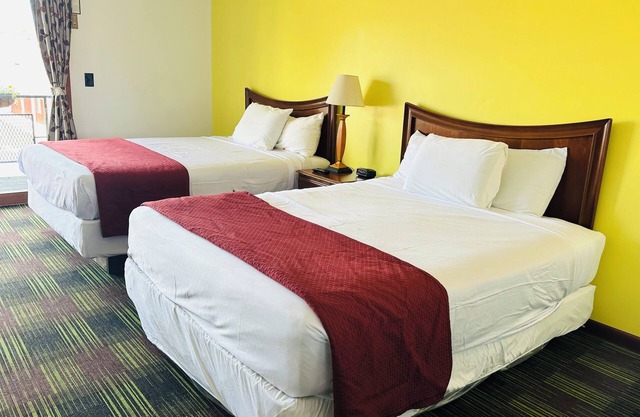 2 Queen Room with Large Pool!