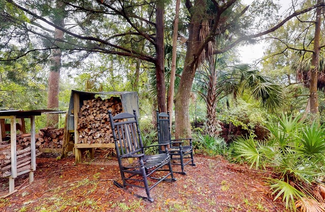 2 riverfront cabins with large yard, grill, firepit, canoe, & private W/D