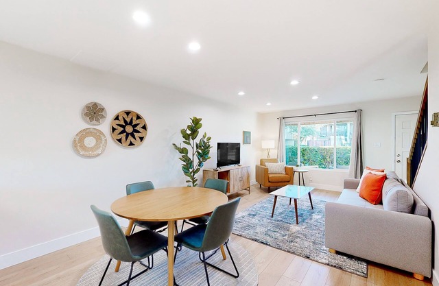 2-story dog-friendly condo with patio, outdoor pool, W/D, streaming, partial AC