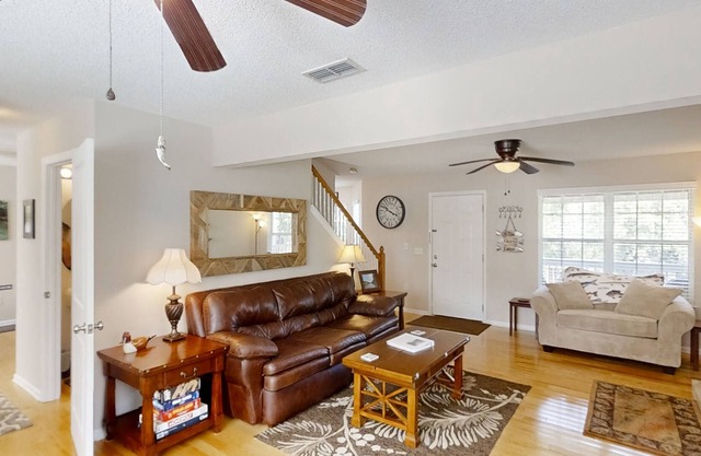 2-story riverfront home with great views, wraparound decks, dock, kayaks & canoe