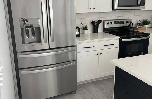 2021 Built Above Garage 1 BR Carriage House Apt