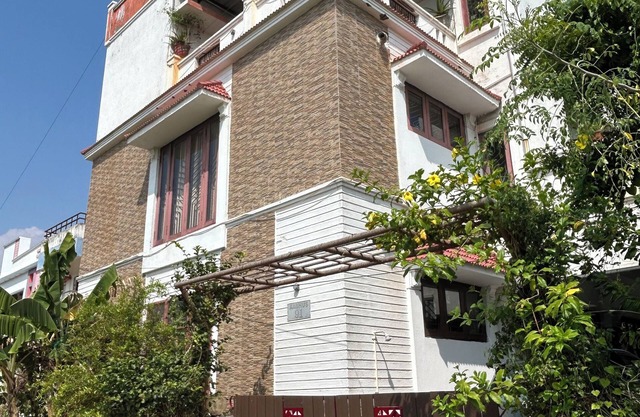 2BHK rooms for family and friends at Kovalam with nearby backwater and beach.