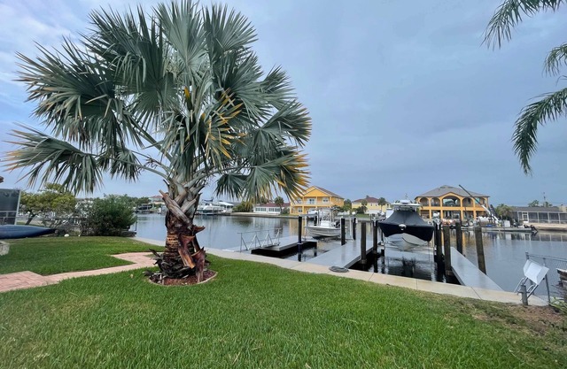 3 Bed 3 Bath home with pool and dock on large quiet canal in Gulf Harbors
