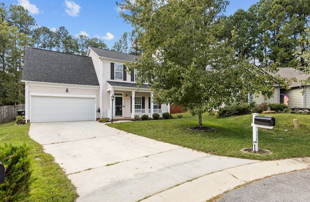 4 bedroom, 2 1/2 bathroom single family home with garage and fenced in yard!