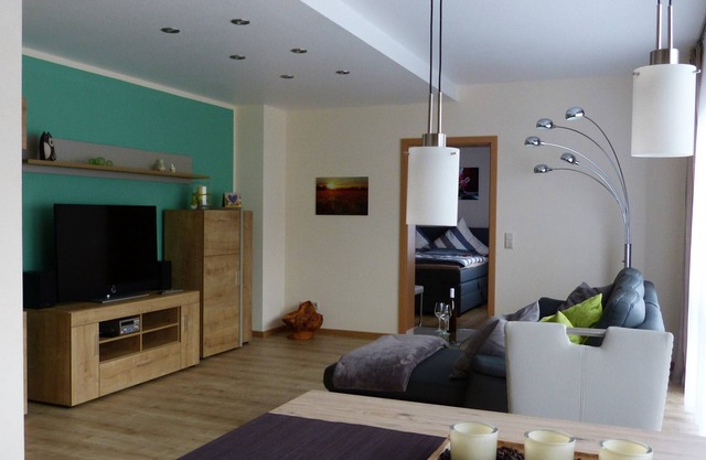 4 star FEWO on the ground floor, parking lot and wallbox, sep. Entrance, terrace, beach chair