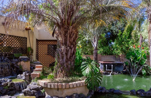 5 Bedroom home with an amazing back yard including a pool and large Koi ponds