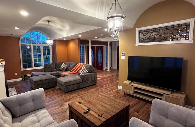 5-bedroom oasis in central St. John's, featuring a deck overlooking lush greens.