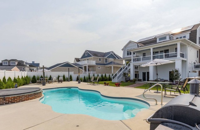 6BR/5BA custom beach home with private pool and hot tub; entertainment rooms