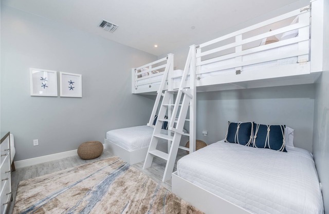 7 Mile Beach Beach Penthouse. Ocean views from Roof Terrace and a Pool Pavilion