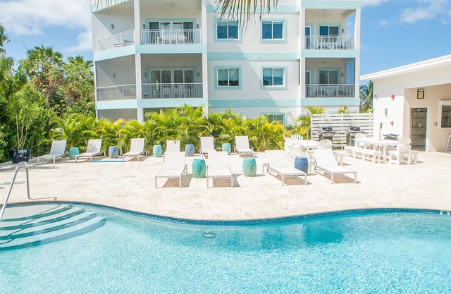 7 Mile Beach Penthouse with Private Beach Club. Ocean views from Roof Terrace.