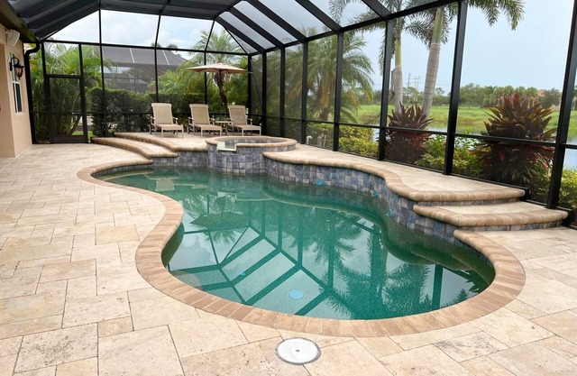 8204 Beautiful pool home with gorgeous lake and golf view