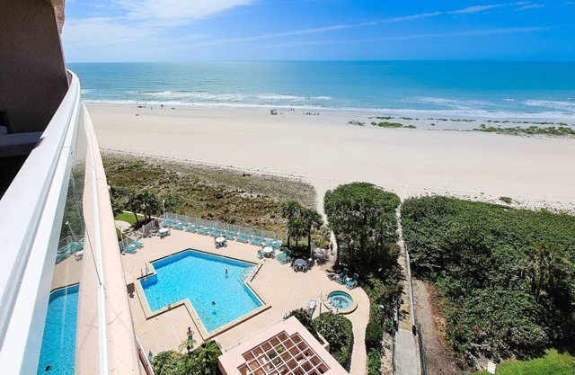 9th-floor beachfront condo with multiple balconies, pool, gym & sauna