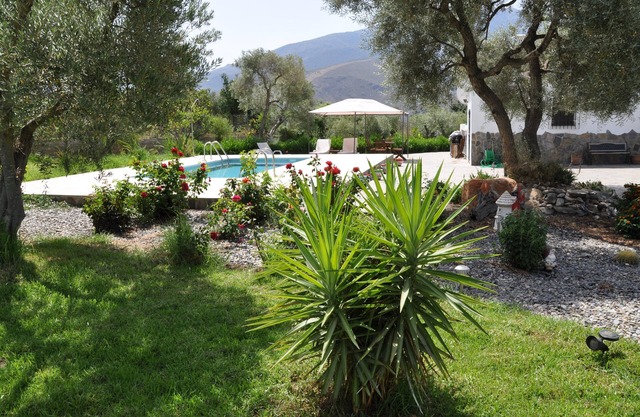 A 2 bedroom country house with large private garden and swimming pool
