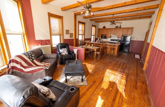 A 3-bedroom 2nd floor atop local bar/restaurant.