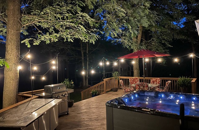 A beautiful recently remodeled home nested on a wooded river lot with a hot tub.