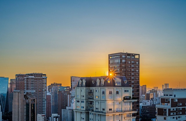 Amazing views: sunsets over city skyline from balcony garden, Gym & Pools @ VNC