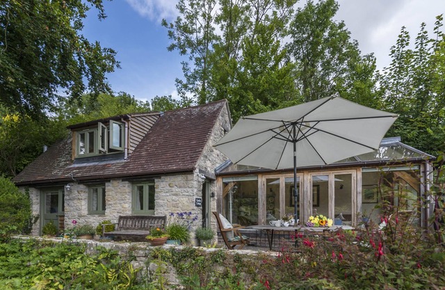 A charming detached stone cottage situated on an elevated site above Upwey.