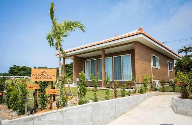 A condominium featuring red roof tiles It is a q/Miyakojima Okinawa